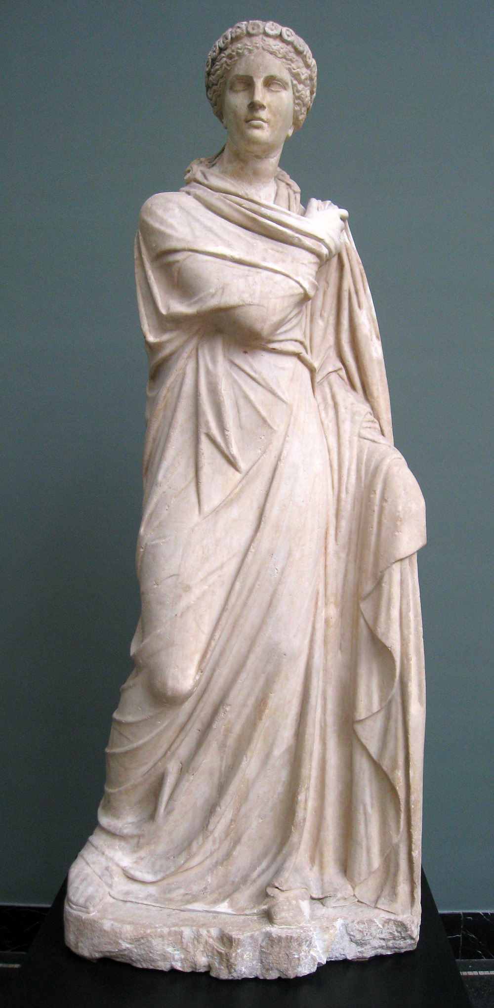 Roman statue of Polyhymnia, 2nd century AD, depicting her in the act of dancing.