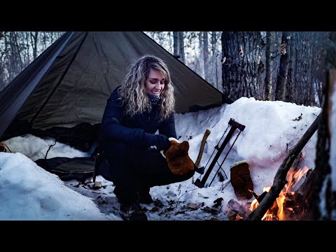 Solo winter bushcraft overnighter | snow trench/tarp shelter | minimal gear, subzero temps