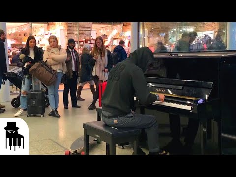 Skateboarder in hoodie amazes public with sublime piano music