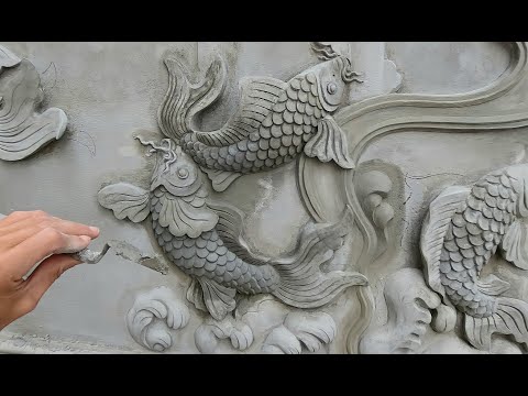 Make a bas-relief of a pair of carp / cement sand / lifelike beautiful